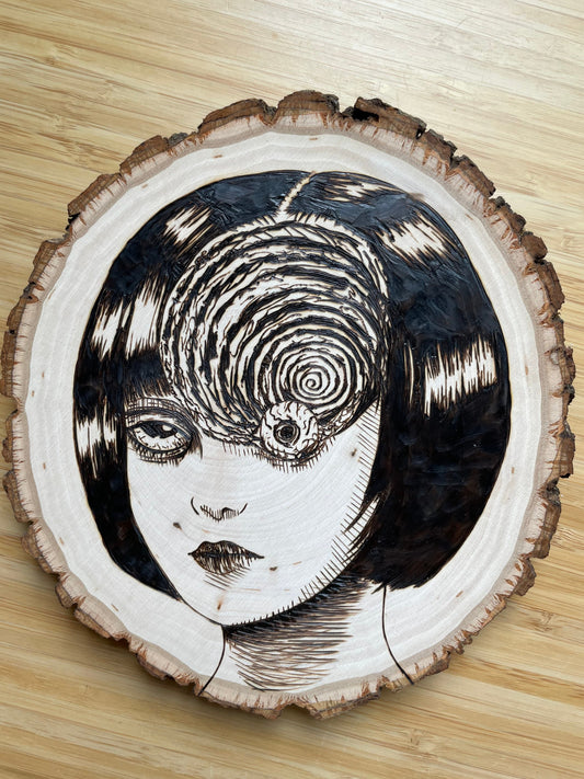 Wood Burned Portrait of spiral girl